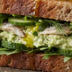 Mediterranean sardine and avocado protein sandwich on whole grain bread