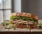 Healthy Mediterranean sardine sandwich with arugula and lemon on toasted bread"